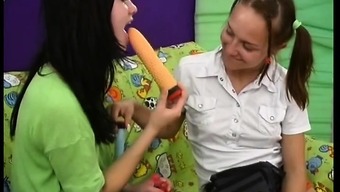 Two barely legal lesbian beauties make each other wet with toys