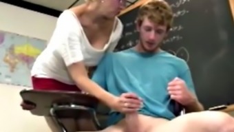 Shorthaired blonde gilf teacher strokes his hard cock