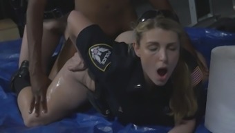 Round ass female cop is having an orgasm while a black guy nails her