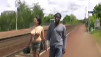 French Girl fucks african in the car and bus stop