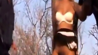 African cock loving whore caught in a nasty outdoor threesome and BDSM