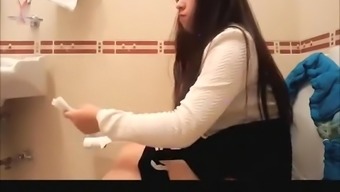 Long hair teen spied in bathroom pissing