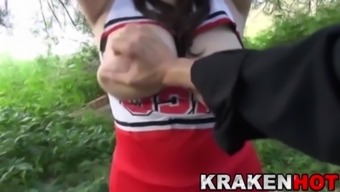 Krakenhot - Chubby cheerleader in submission games outdoor