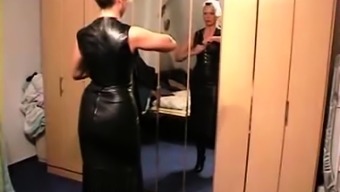 Lady putting on leather clothes