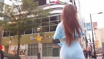Russian brunette flaunts her curves in public
