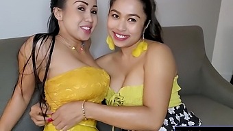 Two Thai girls with big natural tits explore their sexuality in this homemade video