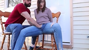 Bearded guy jerks off his girlfriend's pussy on the porch until she squirts