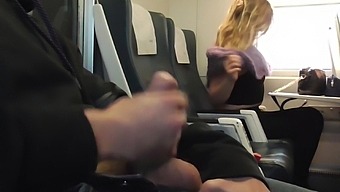 Blonde babe gives a public blowjob in the train