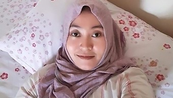 Watch my wife in hijab get pleasure in this teen (18+) video